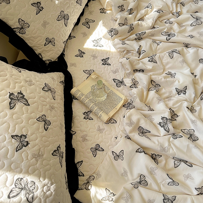 91家纺网 家纺一手货源 找家纺 美梦家纺 2025新款水洗棉花边夹棉床盖款四件套 蝴蝶