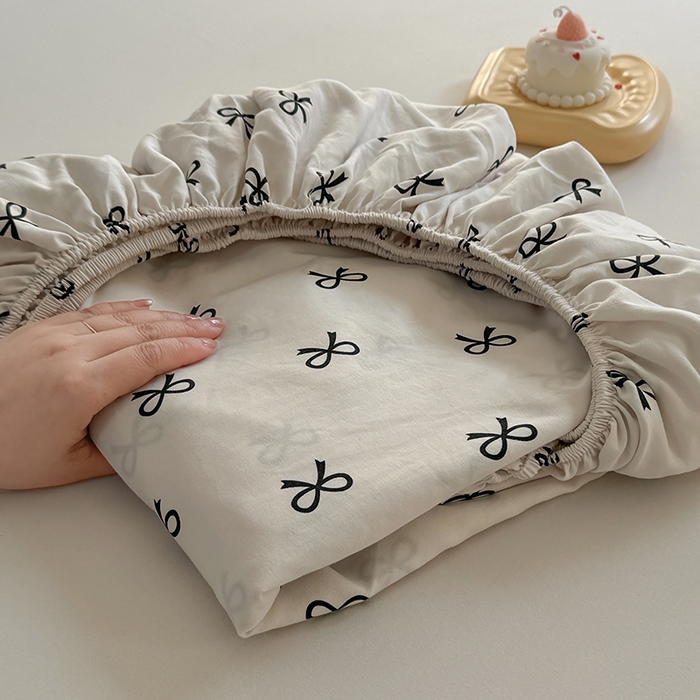 91家纺网 家纺一手货源 找家纺 十一家居 2025新款ins韩系卡通印花亲肤水洗棉床笠 黑色可颂