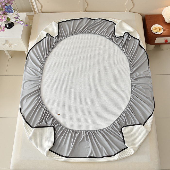 91家纺网 家纺一手货源 找家纺 炫拼  2025新款A类凉豆豆华夫格卡通绣花床笠款三件套 随意的狗