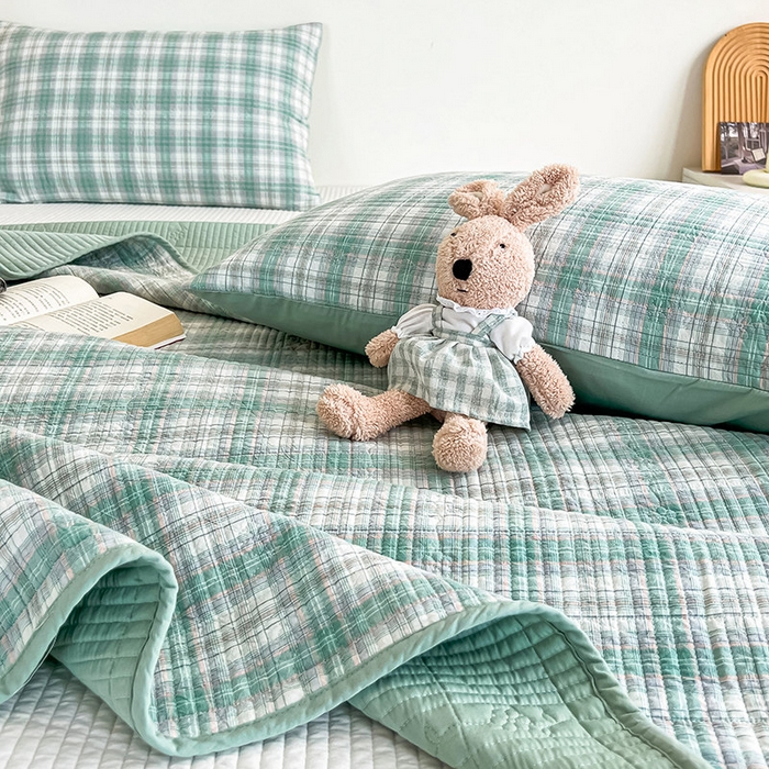 91家纺网 家纺一手货源 找家纺 沐纯家居 2025新款格子款天丝棉床盖三件套 布丁绿