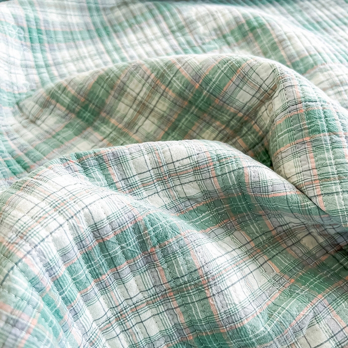 91家纺网 家纺一手货源 找家纺 沐纯家居 2025新款格子款天丝棉床盖三件套 布丁绿