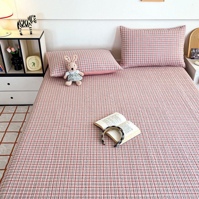 91家纺网 家纺一手货源 找家纺 沐纯家居 2025新款格子款天丝棉床盖三件套 布丁粉