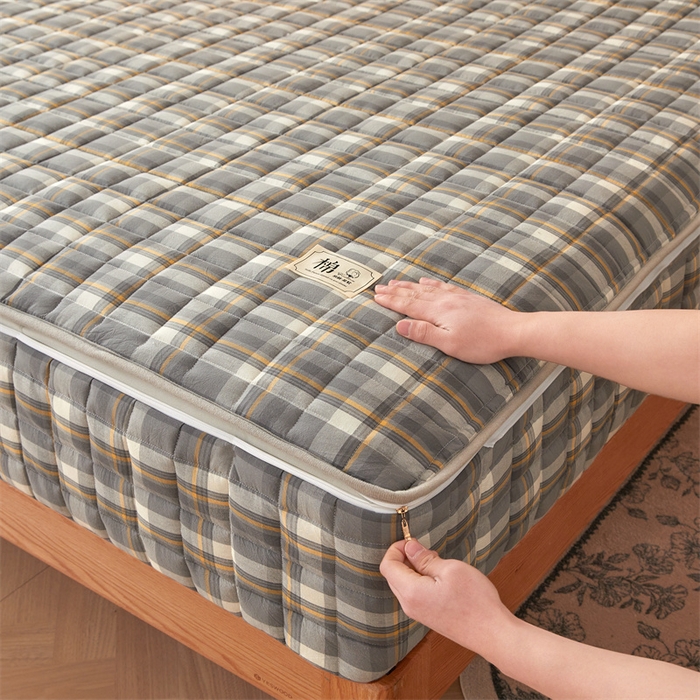 91家纺网 家纺一手货源 找家纺 伊人坊2025新款全棉色织水洗棉六面全包床笠床垫保护套无印风 夹棉床围-诺卡格