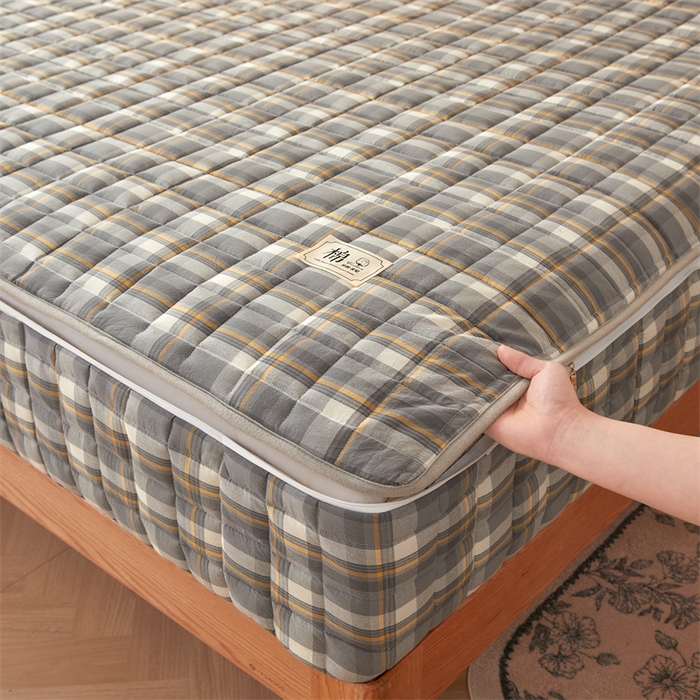 91家纺网 家纺一手货源 找家纺 伊人坊2025新款全棉色织水洗棉六面全包床笠床垫保护套无印风 夹棉床围-诺卡格