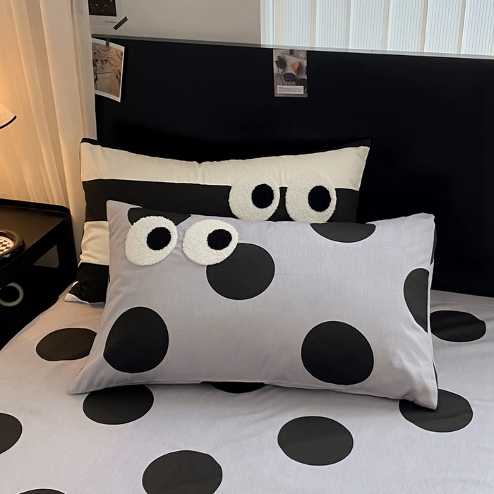 91家纺网 家纺一手货源 找家纺 吉象 2025新款大眼睛毛巾绣四件套 大眼睛-波点魅惑黑