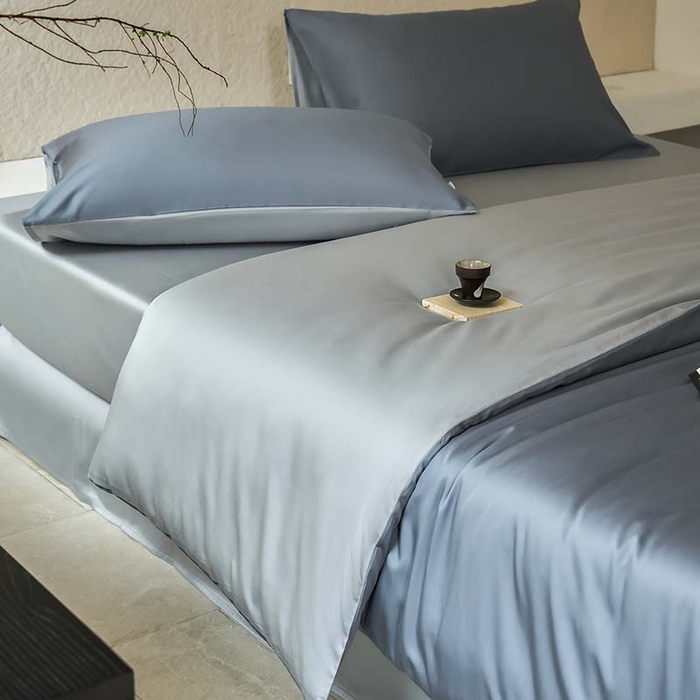 91家纺网 家纺一手货源 找家纺 咏绒家纺工厂店 2025新款60支奥地利兰精天丝纯色天丝棉四件套 菘蓝（暮色灰紫-朦胧灰）