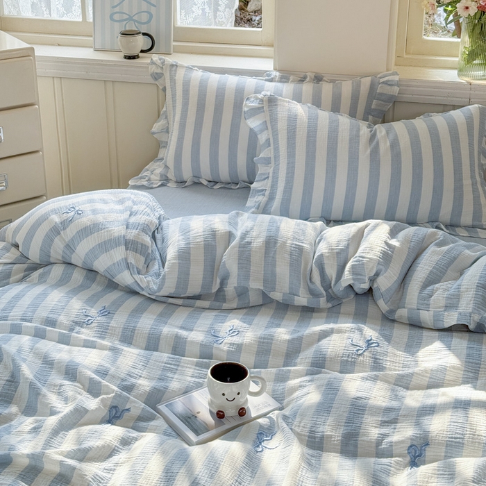 91家纺网 家纺一手货源 找家纺 2025新品全棉色织皱皱纱刺绣款四件套 爱丽丝的梦 兰