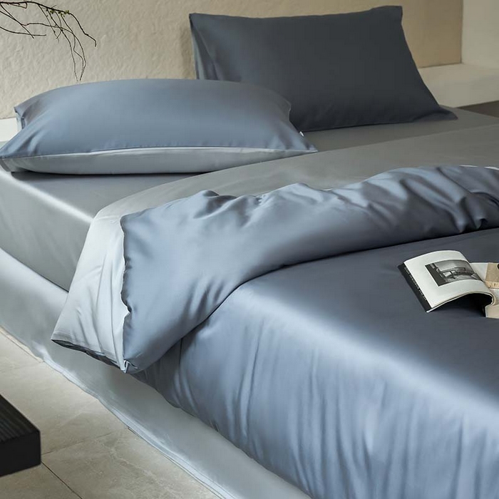 91家纺网 家纺一手货源 找家纺 咏绒家纺工厂店 2025新款60支奥地利兰精天丝纯色天丝棉四件套 菘蓝（暮色灰紫-朦胧灰）