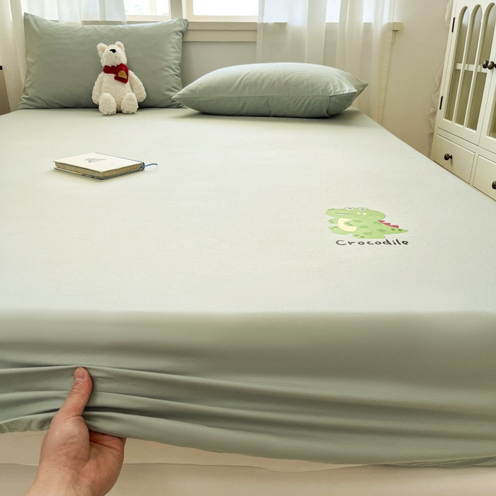 91家纺网 家纺一手货源 找家纺 泽西2025新品全棉卡通床笠 开心鳄-豆绿