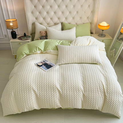 91家纺网 家纺一手货源 找家纺 悦织湾家纺 2025新款色织提花立体四件套 提花水立方奶白果绿