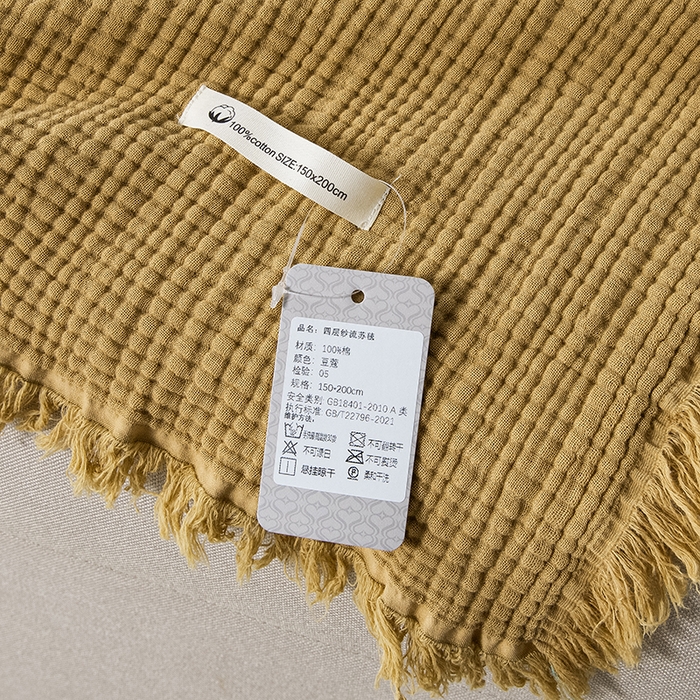 91家纺网 家纺一手货源 找家纺 皇寝世家家居 2025新款A类全棉针织四层纱苏流毯子沙发盖毯 午睡复古毛毯 静谧-焦糖