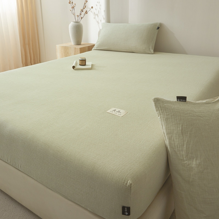 91家纺网 家纺一手货源 找家纺 鑫钰 2025新款纯色系列全棉双层皱皱纱床单-床笠 淡雅绿-床笠
