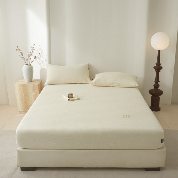 91家纺网 家纺一手货源 找家纺 鑫钰 2025新款纯色系列全棉双层皱皱纱床单-床笠 奶茶白-床笠