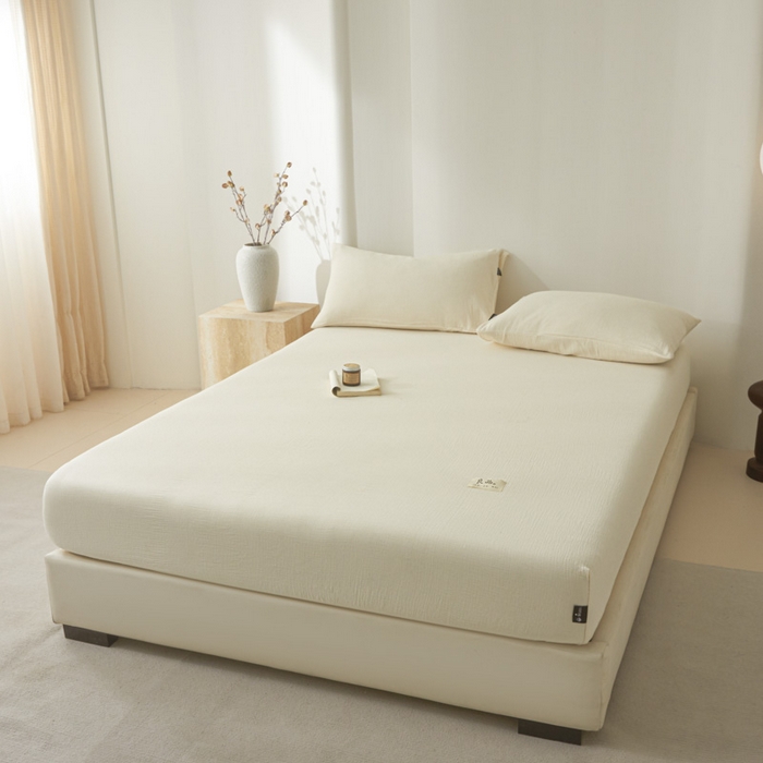 91家纺网 家纺一手货源 找家纺 鑫钰 2025新款纯色系列全棉双层皱皱纱床单-床笠 奶茶白-床笠