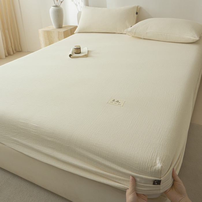 91家纺网 家纺一手货源 找家纺 鑫钰 2025新款纯色系列全棉双层皱皱纱床单-床笠 奶茶白-床笠