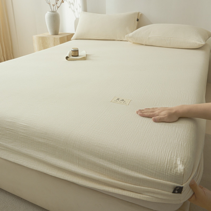 91家纺网 家纺一手货源 找家纺 鑫钰 2025新款纯色系列全棉双层皱皱纱床单-床笠 奶茶白-床笠