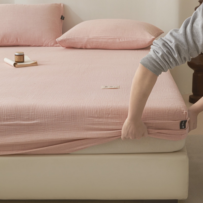 91家纺网 家纺一手货源 找家纺 鑫钰 2025新款纯色系列全棉双层皱皱纱床单-床笠 仙女粉-床笠
