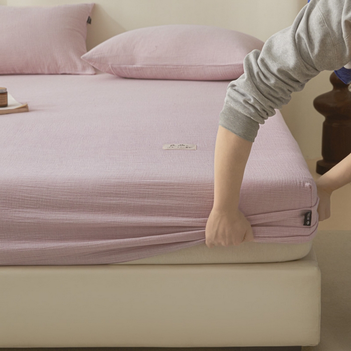 91家纺网 家纺一手货源 找家纺 鑫钰 2025新款纯色系列全棉双层皱皱纱床单-床笠 香妃紫-床笠