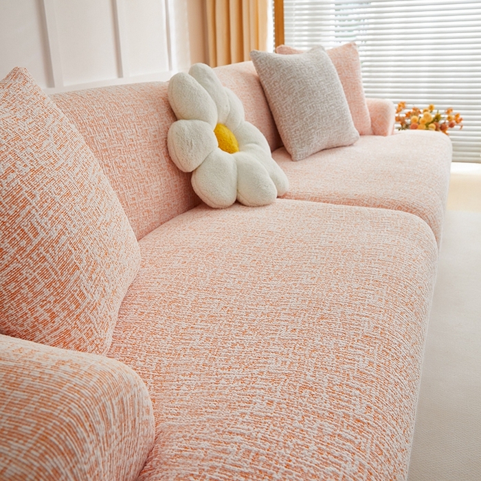91家纺网 家纺一手货源 找家纺 丝绮鹿 2025新款竹节雪尼尔沙发套松紧款（大三人图）  奶油橘