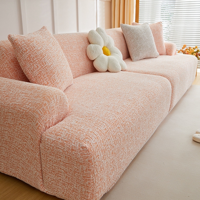 91家纺网 家纺一手货源 找家纺 丝绮鹿 2025新款竹节雪尼尔沙发套松紧款（大三人图）  奶油橘