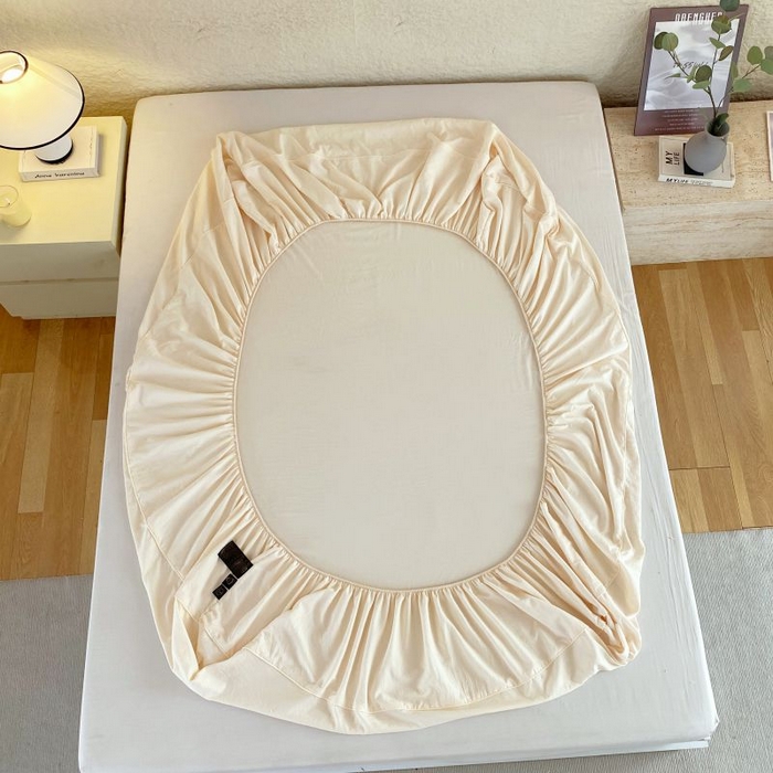 91家纺网 家纺一手货源 找家纺 恋之语 2025新款纯色亲肤舒适麻绳款床笠 米黄粉