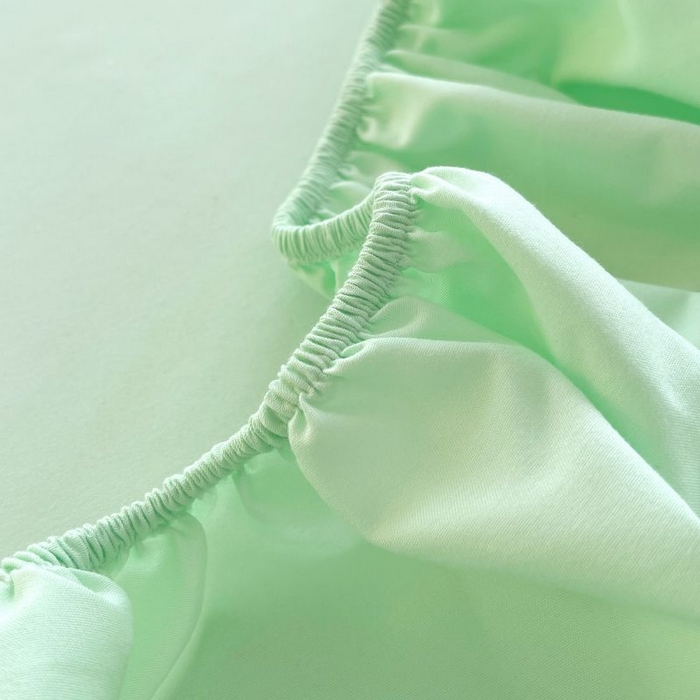 91家纺网 家纺一手货源 找家纺 恋之语 2025新款纯色亲肤舒适贴布标单床笠90克 果绿