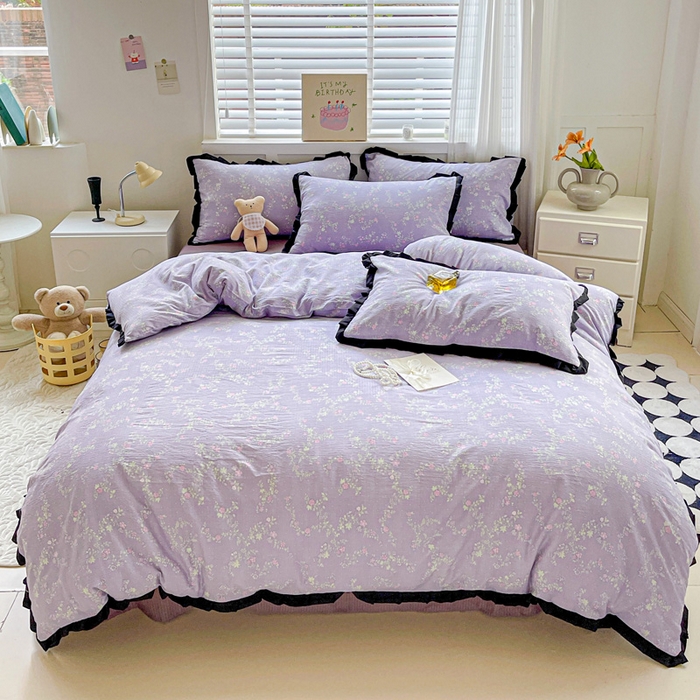 91家纺网 家纺一手货源 找家纺 优选 2025新款直播热款赫本风花边款针织皱皱纱法式印花吊边床单三件套床笠四件套 艾薇紫