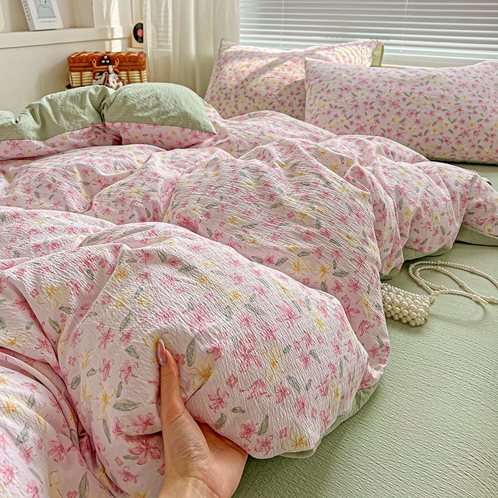 91家纺网 家纺一手货源 找家纺 金梦拉家纺 2025新款提花纱布棉双层纱皱皱纱四件套 粉杏绿