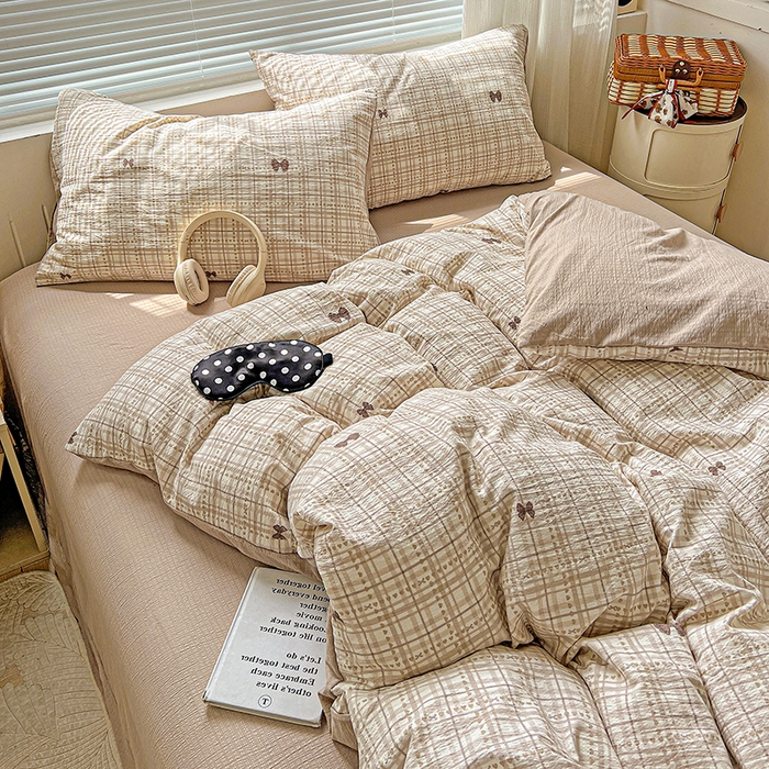 91家纺网 家纺一手货源 找家纺 金梦拉家纺 2025新款提花纱布棉双层纱皱皱纱四件套 咖调蝴蝶结