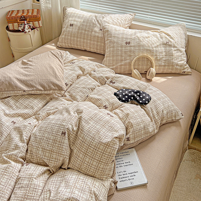 91家纺网 家纺一手货源 找家纺 金梦拉家纺 2025新款提花纱布棉双层纱皱皱纱四件套 咖调蝴蝶结