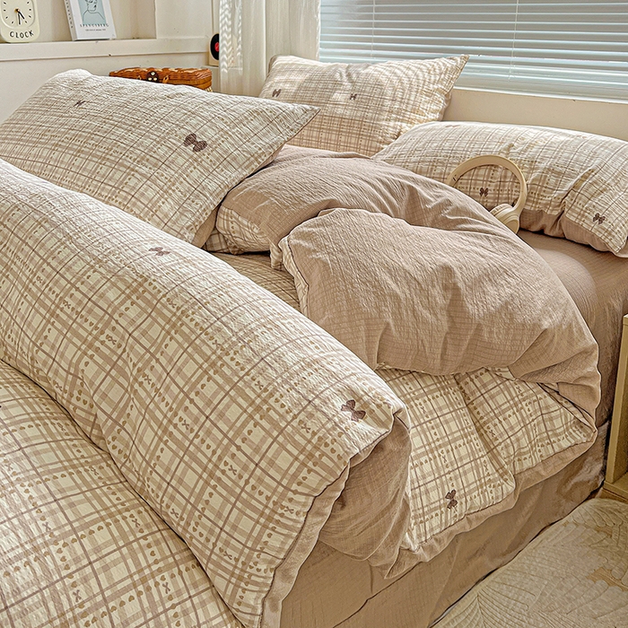 91家纺网 家纺一手货源 找家纺 金梦拉家纺 2025新款提花纱布棉双层纱皱皱纱四件套 咖调蝴蝶结