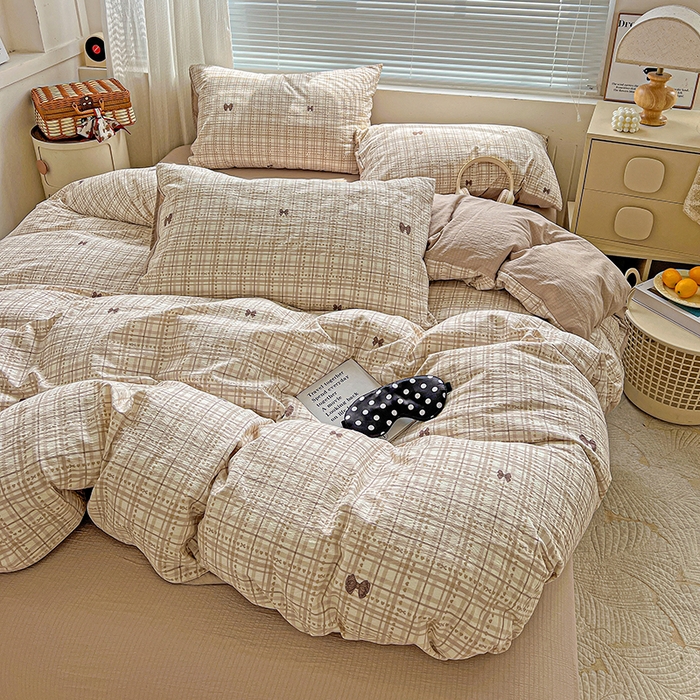 91家纺网 家纺一手货源 找家纺 金梦拉家纺 2025新款提花纱布棉双层纱皱皱纱四件套 咖调蝴蝶结