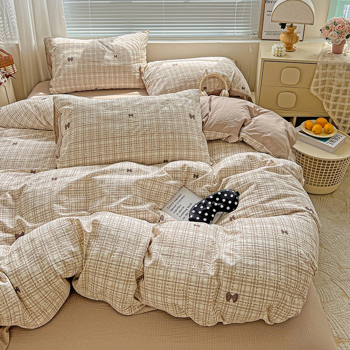 91家纺网 家纺一手货源 找家纺 金梦拉家纺 2025新款提花纱布棉双层纱皱皱纱四件套 咖调蝴蝶结