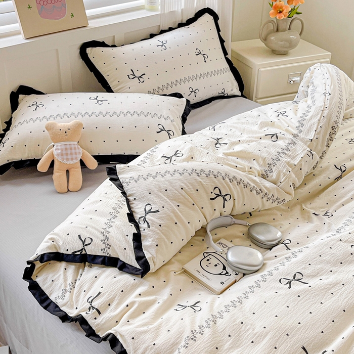 91家纺网 家纺一手货源 找家纺 暖芯优选 2025新款直播热款赫本风花边款针织法式印花吊边床单三件套床笠四件套 爱心蝴蝶结-米