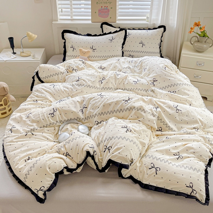 91家纺网 家纺一手货源 找家纺 暖芯优选 2025新款直播热款赫本风花边款针织法式印花吊边床单三件套床笠四件套 爱心蝴蝶结-米