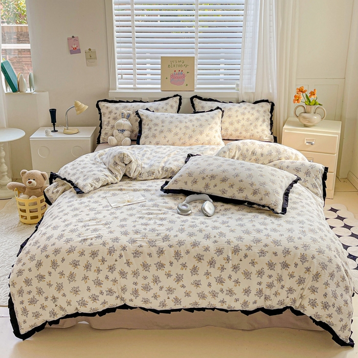 91家纺网 家纺一手货源 找家纺 暖芯优选 2025新款直播热款赫本风花边款针织法式印花吊边床单三件套床笠四件套 白茶