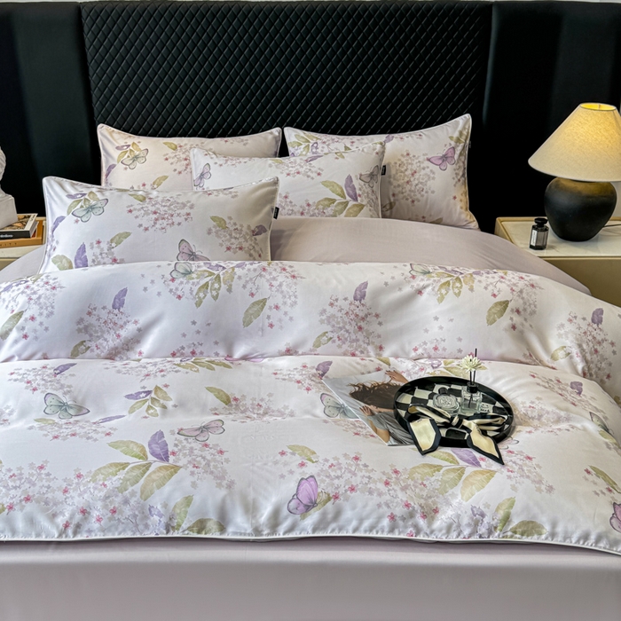 91家纺网 家纺一手货源 找家纺 芊寻家居 2025春夏新款50支莱赛尔天丝贡缎数码印花麻绳款四件套高端礼盒 蝶恋花紫