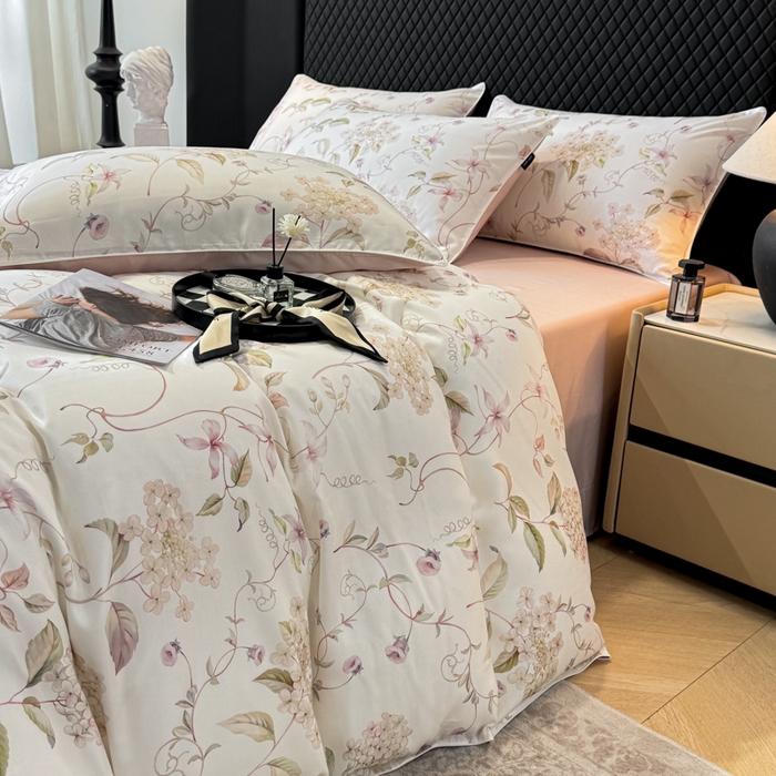 91家纺网 家纺一手货源 找家纺 芊寻家居 2025春夏新款50支莱赛尔天丝贡缎数码印花麻绳款四件套高端礼盒 绣球花语粉