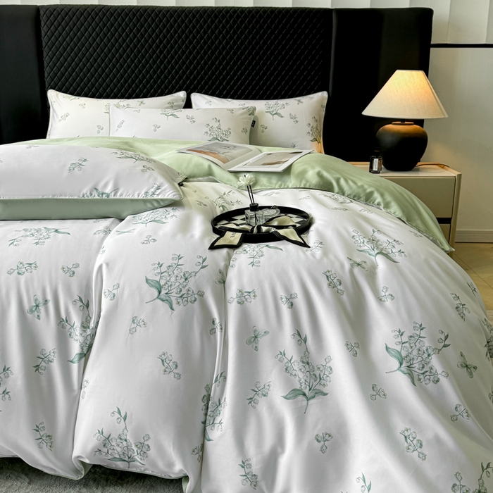 91家纺网 家纺一手货源 找家纺 洺兰家居 2025春夏新款100支莱赛尔天丝贡缎数码印花麻绳款四件套高端礼盒 铃兰花语绿