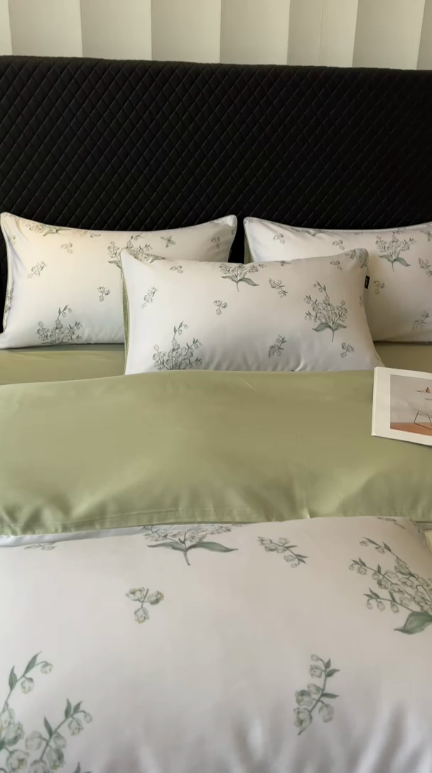 91家纺网 家纺一手货源 找家纺 芊寻家居 2025春夏新款50支莱赛尔天丝贡缎数码印花麻绳款四件套高端礼盒 铃兰花语绿