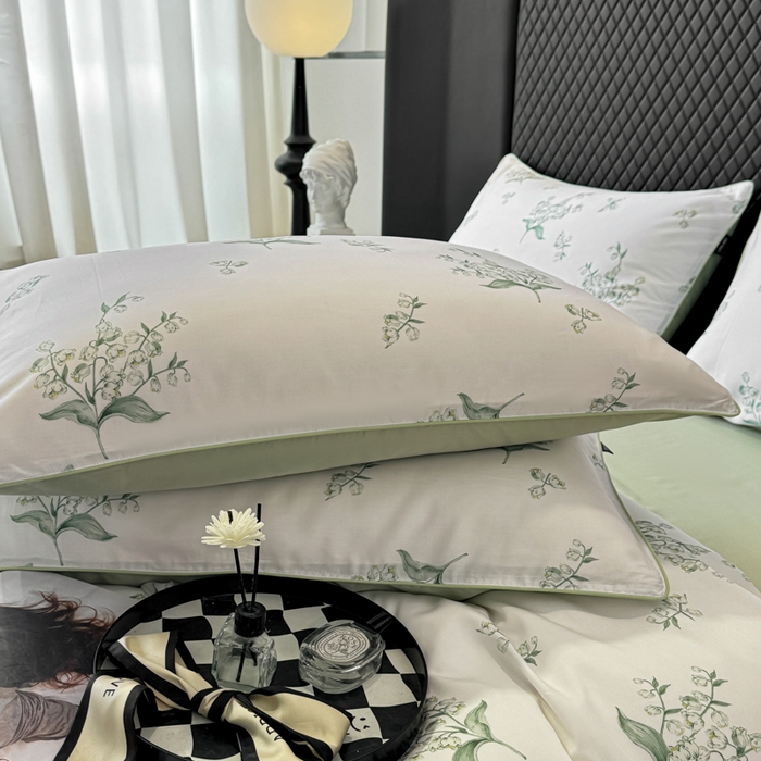 91家纺网 家纺一手货源 找家纺 洺兰家居 2025春夏新款100支莱赛尔天丝贡缎数码印花麻绳款四件套高端礼盒 铃兰花语绿