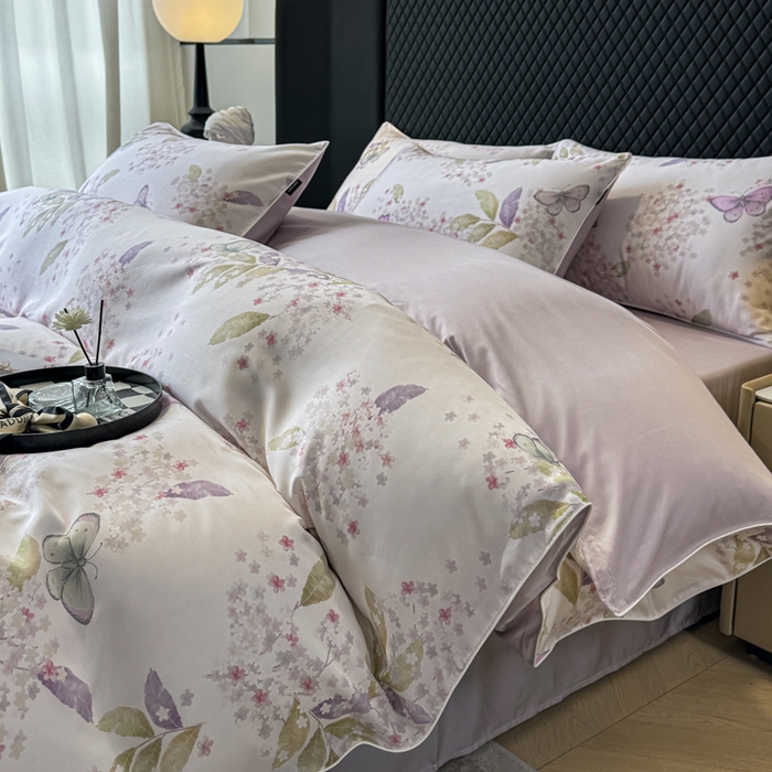 91家纺网 家纺一手货源 找家纺 洺兰家居 2025春夏新款100支莱赛尔天丝贡缎数码印花麻绳款四件套高端礼盒 蝶恋花紫