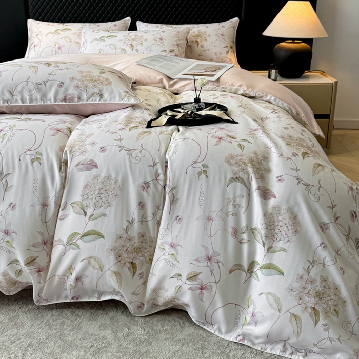 91家纺网 家纺一手货源 找家纺 洺兰家居 2025春夏新款100支莱赛尔天丝贡缎数码印花麻绳款四件套高端礼盒 绣球花语粉