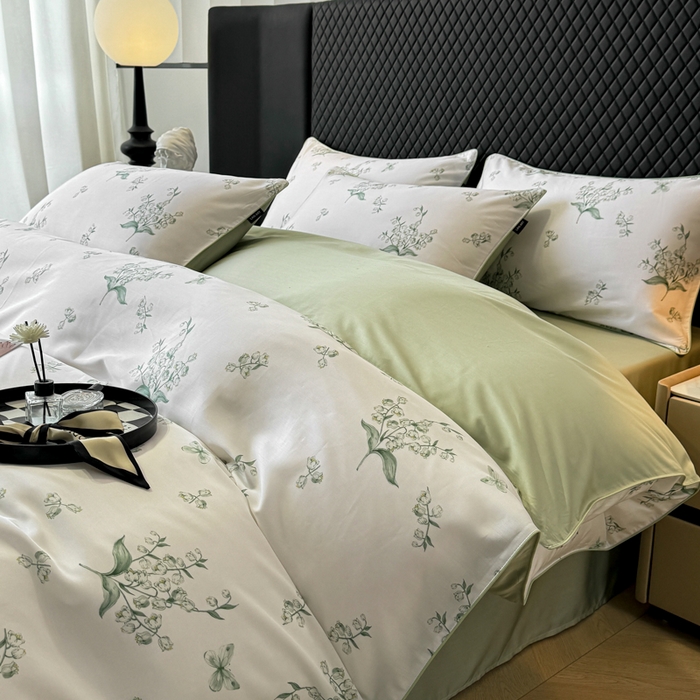 91家纺网 家纺一手货源 找家纺 洺兰家居 2025春夏新款100支莱赛尔天丝贡缎数码印花麻绳款四件套高端礼盒 铃兰花语绿