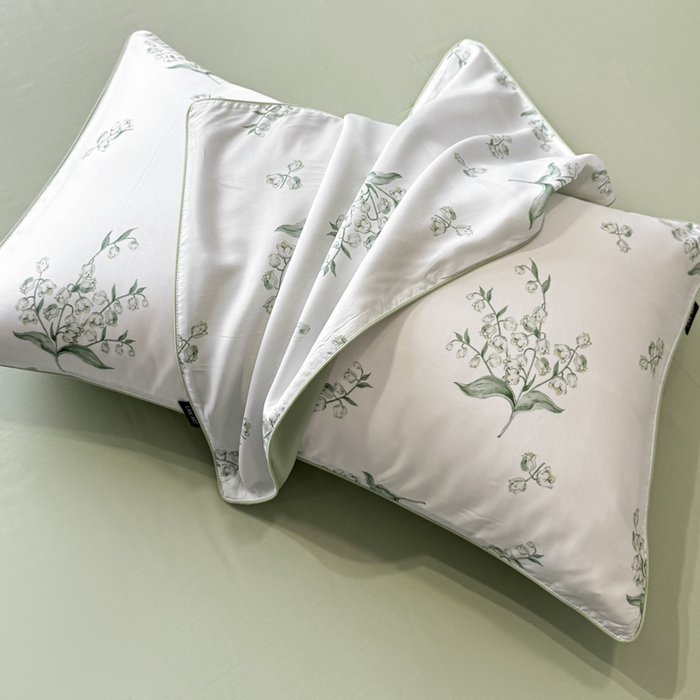 91家纺网 家纺一手货源 找家纺 洺兰家居 2025春夏新款100支莱赛尔天丝贡缎数码印花麻绳款四件套高端礼盒 铃兰花语绿