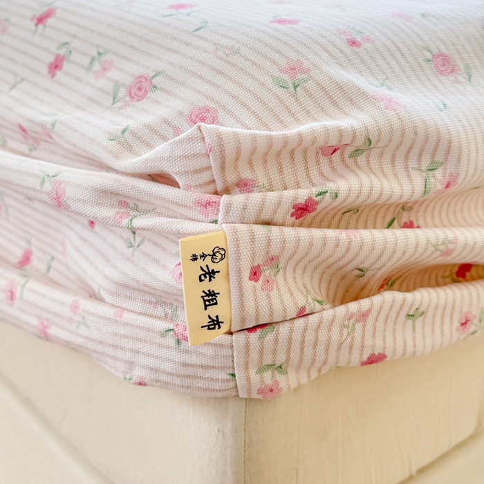 91家纺网 家纺一手货源 找家纺 2025新款老粗布三件套-床笠款 花遇