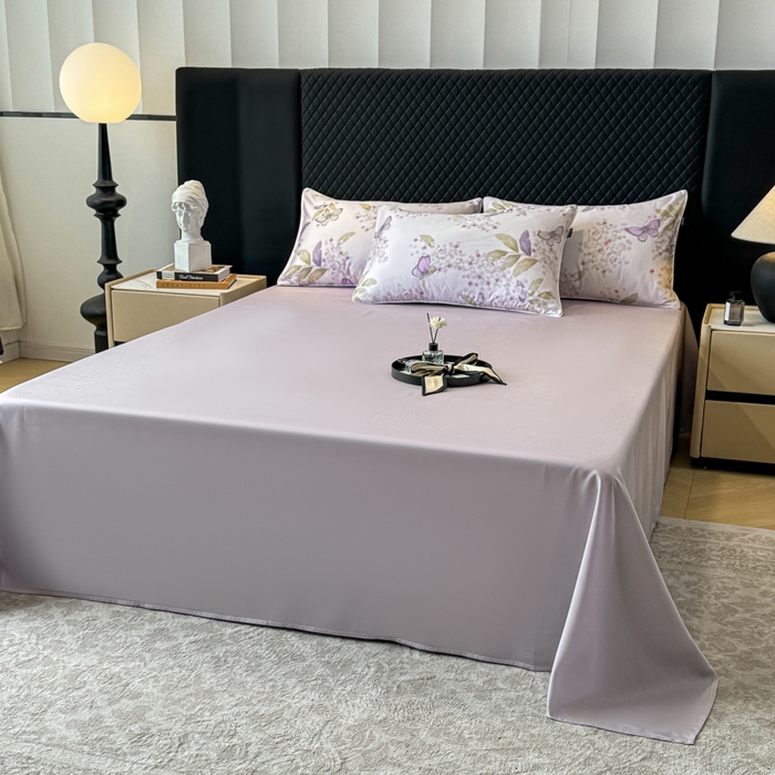 91家纺网 家纺一手货源 找家纺 洺兰家居 2025春夏新款100支莱赛尔天丝贡缎数码印花麻绳款四件套高端礼盒 蝶恋花紫