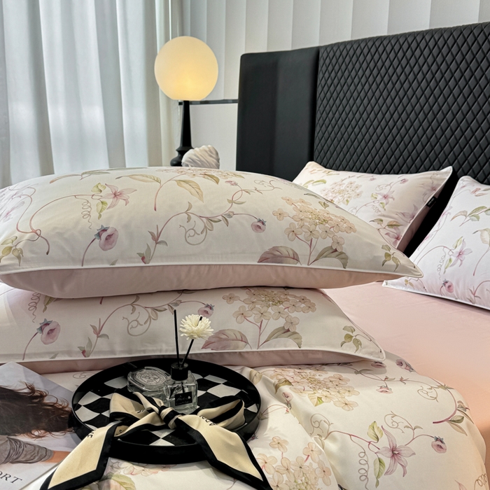 91家纺网 家纺一手货源 找家纺 洺兰家居 2025春夏新款100支莱赛尔天丝贡缎数码印花麻绳款四件套高端礼盒 绣球花语粉