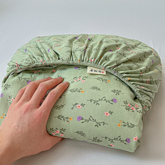 91家纺网 家纺一手货源 找家纺 忆生活家纺 2025新款全棉纯棉老粗布印花床单三件套 春意-绿