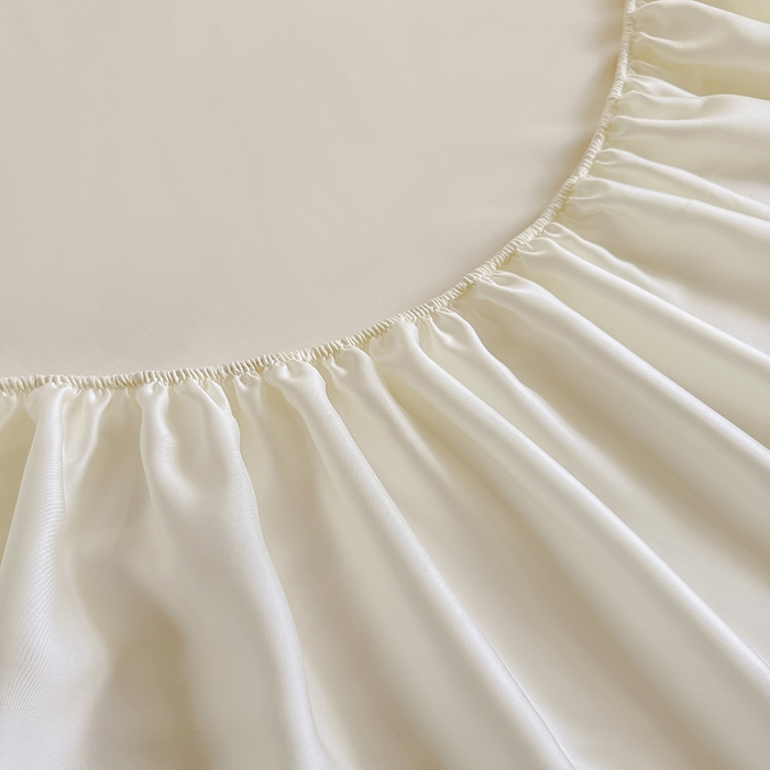 91家纺网 家纺一手货源 找家纺 金喜 2025新款LF级60支莱赛尔天丝床笠三件套纯色天丝床笠 奶昔米